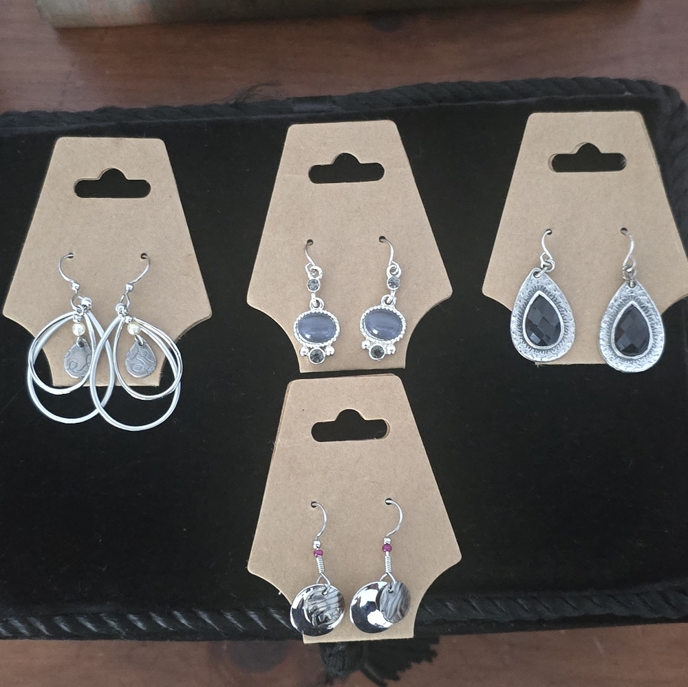 4 Pairs Of Silvertone Earrings